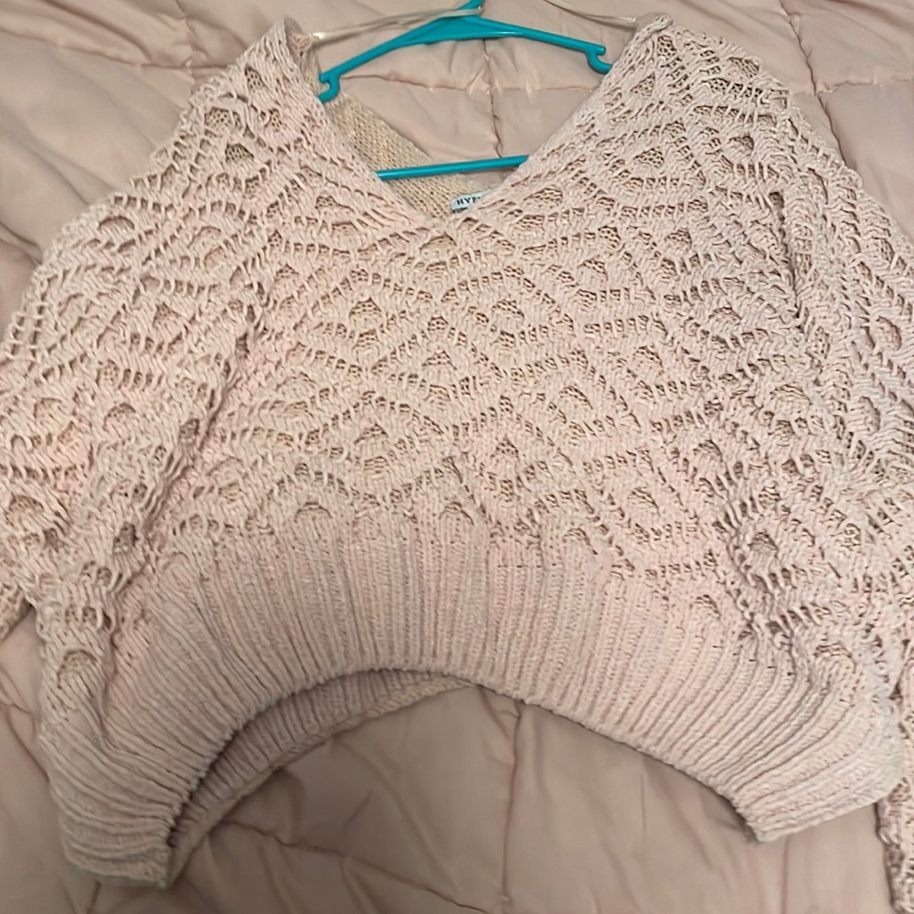 It’s is a size small. It is a really cute sweater.